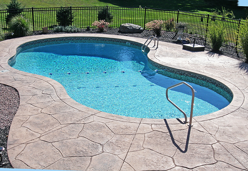Swimming pool and stamped concrete project example 163